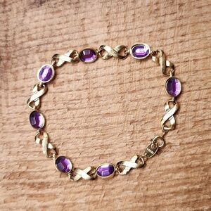 Vintage Avon‎ Infinity Chain Gold Tone Purple Cabochon Tennis Bracelet